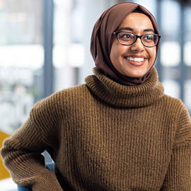 a person smiling for the camera