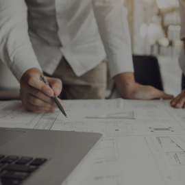 person drawing some sketches