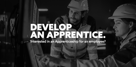 Develop an apprentice. Interested in an Apprenticeship for an employee? Image of male and female construction Apprentices gathered round a computer.