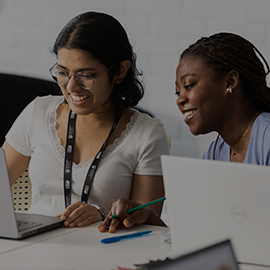 students looking at laptop
