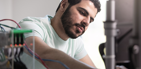 Northumbria student carrying out work on a computer.