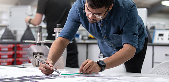 Engineering student working in a lab.