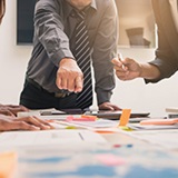 a group of people sitting at a table