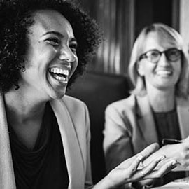 a group of people sitting posing for the camera