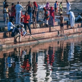 a group of people swimming in the water