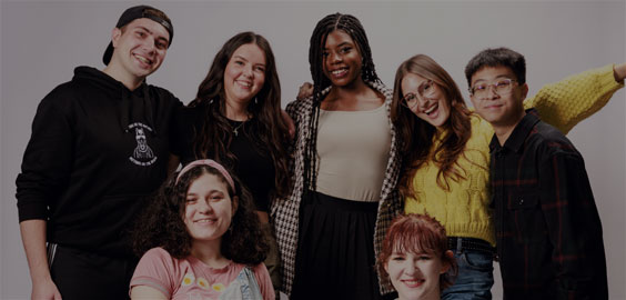Group shot of 7 of Northumbria's DCC's as part of the 'I Am Northumbria' campaign; they are smiling against a plain, white background.