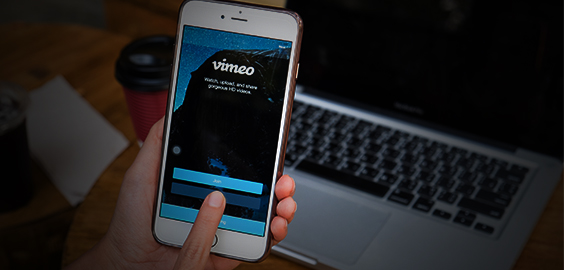 a hand holding a cell phone