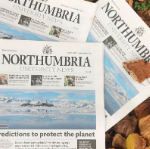 a close up of a newspaper