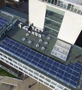 a circuit board in front of a building
