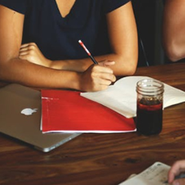 a woman sitting at a table