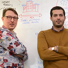 a couple of people posing for the camera