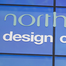 a blue and white sign