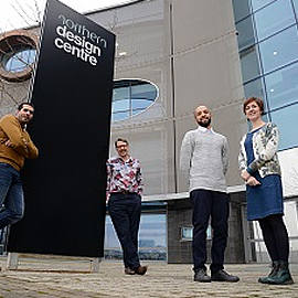 a group of people standing in front of a building