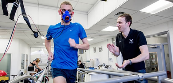 a group of people standing in a room