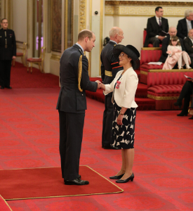 a group of people standing in a room