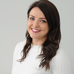 a woman smiling for the camera