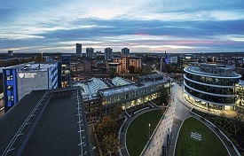a view of a city on a train track