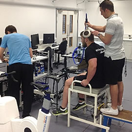 a group of people standing in a room