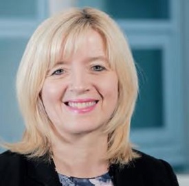 a woman smiling for the camera