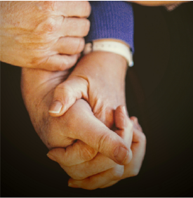 Photo showing people of different ages holding hands