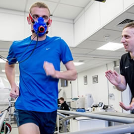 Image of a man running in a laboratory environment