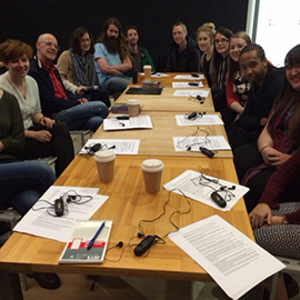 Image showing PG researchers around a table