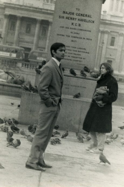 a group of people on a sidewalk