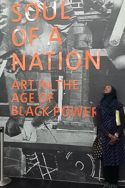 a person holding a sign