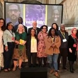 a group of people posing for a photo