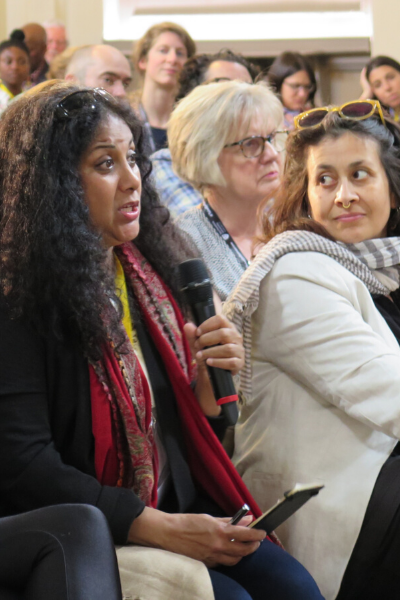 a group of people around each other