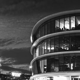 a double decker bus driving down a street
