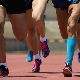a woman standing in front of a crowd