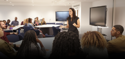 lecturer talking to students