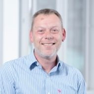 a man smiling for the camera