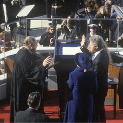 a group of people standing in front of a crowd