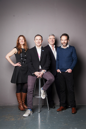 a group of people posing for the camera