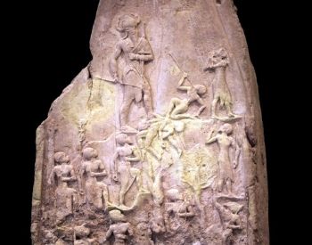 a stone statue of a person