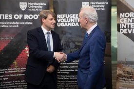 a man wearing a suit and tie