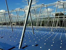 a close up of a boat next to a body of water