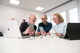 a group of people sitting at a table