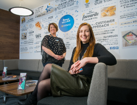 a man and a woman sitting on a couch