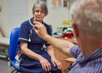 a man in a blue shirt