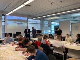 a group of people sitting at a table