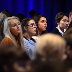 a group of people posing for the camera