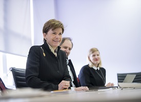 a man and a woman sitting at a desk