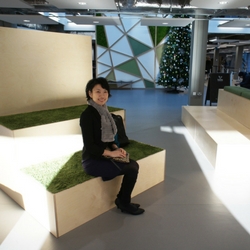 a person sitting at a table in a room