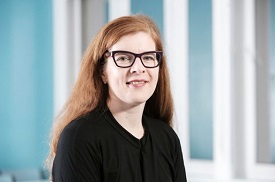 a person standing in front of a window