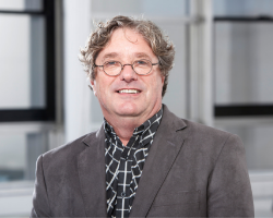 a person wearing a suit and tie