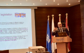 a stack of flyers on a table