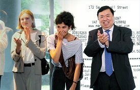 a group of people posing for the camera